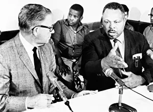 Csubeta Prints: Former light heavyweight champion Archie Moore holds a Washington news conference