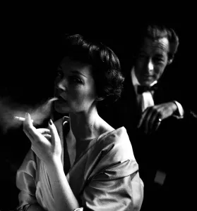 Dramatic Prints: Lilli Palmer, with husband Rex Harrison in background