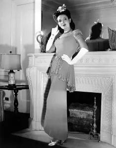 Sequins Prints: Linda Darnell in sequined evening gown, 1945