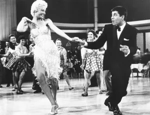 Tuxedo Prints: LIVING IT UP, from left: Sheree North, Jerry Lewis, 1954