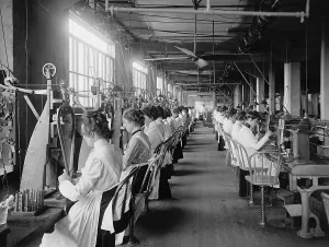 Aprons Prints: Lock and drill department assembly line of women workers at National Cash Register