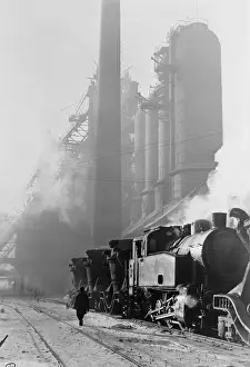 Worker Prints: Locomotive hauling pig iron at the blast-furnace of the Stalin Metallurgical Works