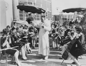 Orchestra Prints: Lon Chaney, as Mr. Wu, conducts All-girl's band that suppli es music for MR WU film