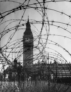 Barbed Wire Prints: London's Big Ben with barbed wire entanglement and soldiers on guard during World War 2