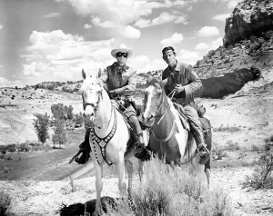 August Prints: THE LONE RANGER, from left: Clayton Moore, Jay Silverheels, 1956