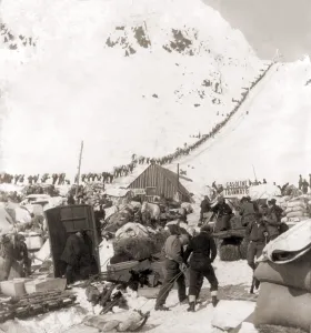 Climbers Prints: Long ribbon of miners bound for the Klondike gold fields climbing over the Chilcoot Pass