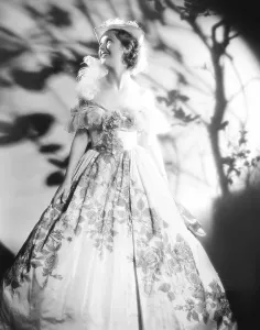 Images Dated 10th February 2014: Loretta Young in 19th century gown for a costume party, 1933