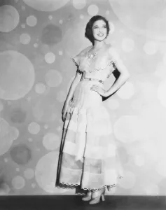 Images Dated 10th February 2014: Loretta Young in pink organdy dress with high waist line belt, 1935