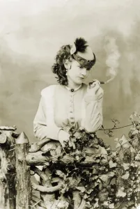 August Prints: Lotta Crabtree, (1847-1924), popular American actress smoking a cigar in a 1868 portrait by J