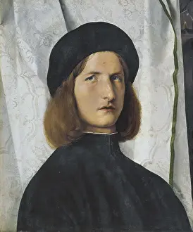 LOTTO, Lorenzo (1480-1556). Portrait of a Youth Against a White Curtain. 1508. Renaissance art. Cinquecento. Venetian school. Oil on wood. AUSTRIA. Vienna