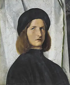 LOTTO, Lorenzo (1480-1556). Portrait of a Youth Against a White Curtain. 1508. Renaissance art. Cinquecento. Venetian school. Oil on wood. AUSTRIA. Vienna