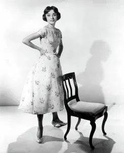Floral Print Prints: LOVE IN THE AFTERNOON, Audrey Hepburn, 1957, chair
