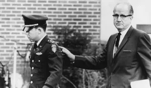 Defendant Prints: Lt. William Calley leaves a military court with his chief civilian attorney