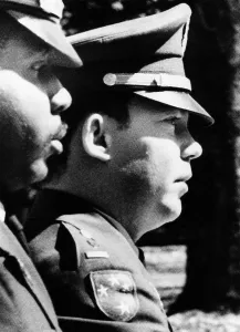 Defendant Prints: Lt. William L. Calley, Jr. escorted to the Fort Benning stockade on March 31