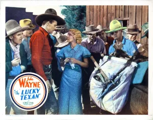 February Prints: THE LUCKY TEXAN, from left, John Wayne, Barbara Sheldon, 1934