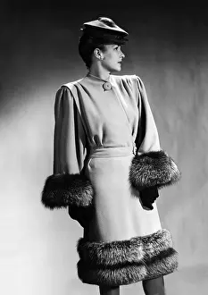 Three Quarters Length Prints: Luxurious fur trimmed dress of 1945