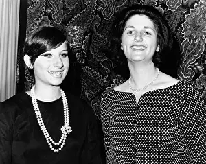 Comedienne Prints: Lynda Bird Johnson (right) is greeted backstage by Barbra Streisand