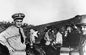 Images Dated 28th March 2007: Lyndon Johnson as a commander during World War II in front of combat planes preparing to take off from Port Moresby