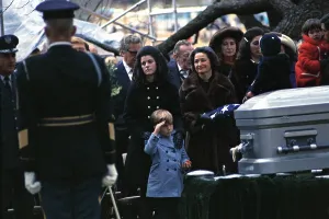 Nugent Prints: Lyndon Johnson funeral. Lyn Nugent salutes his grandfather's coffin at Johnson Family Cemetery at the LBJ Ranch