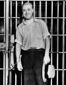 Bootleggers Prints: Machine Gun Kelly, handcuffed to cell bars
