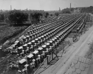 Transportation Prints: Mack war trucks awaiting transport to the U