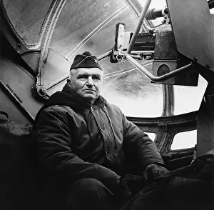 Killed In Action Prints: Maj. Gen. Simon Bolivar Buckner in a cockpit of an airplane