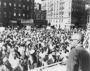 Malcolm X, speaking to an outdoor rally in Harlem in 1963
