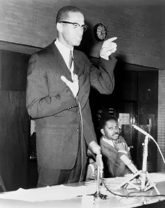Militants Prints: Malcolm X speaks in support of the Harlem school boycott at a rally