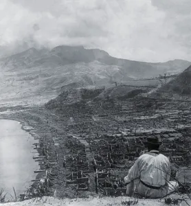 Volcano Prints: Man on Orange Hill looks over the dead city of St
