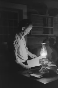 Images Dated 6th March 2012: Man reading by the light of a kerosene lantern