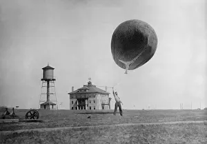 Speed Prints: Man about to release a Weather Bureau balloon