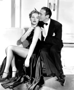 Benny Prints: MAN ABOUT TOWN, from left, Betty Grable, Jack Benny, 1939