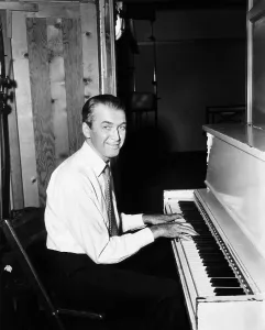 Playing Piano Prints: THE MAN WHO KNEW TOO MUCH, James Stewart, on set, 1956