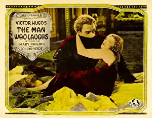 2009 Prints: THE MAN WHO LAUGHS, Half-Sheet poster, left to right: Conrad Veidt, Olga Baclanova, 1928