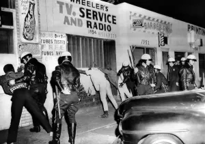 Arrests Prints: March 1966 Watts Riot. Police search African American youths in Watts During the second race riot in eight months