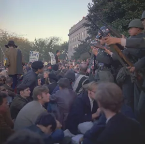 Protesters Prints: March on the Pentagon. Military police keep back protesters at the Mall Entrance to the Pentagon