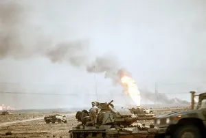 Tanks Prints: US Marine following the retreat of Iraqi forces from Kuwait as during Operation Desert Storm