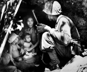 Operation Forager Prints: Marine patrol on Saipan found a Japanese family sheltering in a hillside cave