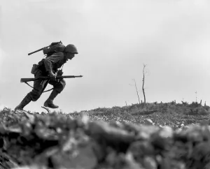 Under Fire Prints: Marine Pfc. Paul E. Ison runs through Japanese machine gun fire on Okinawa, May 10, 1945