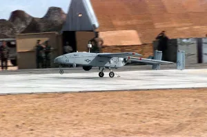 Surveillance Prints: Marine Unmanned Aerial Vehicle lands after a surveillance mission
