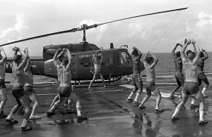 Deck Prints: Marines doing jumping jacks on the deck of the amphibious assault ship USS NEW ORLEANS