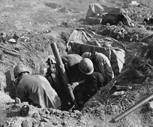 Mortars Prints: Marines fire an 81 mm mortar in the Battle of Obong-ni Ridge
