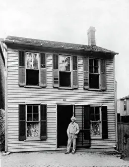 Twain Prints: MARK TWAIN in front of his boyhood home in Hannibal