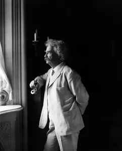 Images Dated 14th December 2007: Mark Twain (Samuel L. Clemens, 1835-1910) American humorist standing by window in 1907 portrait