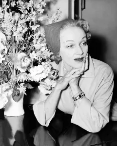 Flowers Prints: Marlene Dietrich, at the Dorchester Hotel in London, May 1955