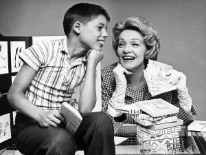 Dietrich Prints: Marlene Dietrich sells a boy Christmas cards at a UNICEF fundraiser