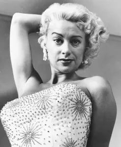 Rhinestones Prints: Martine Carol in white silk sarong encrusted with rhinestones, 1956
