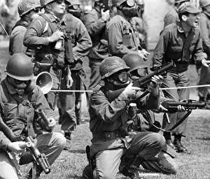 Students Prints: Masked national guardsmen fire barrage of tear gas into crowd of demonstrators on campus of Kent State University