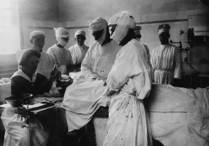 Patients Prints: Masked surgeons perform an operation while a nurse administers ether to anesthetize patient