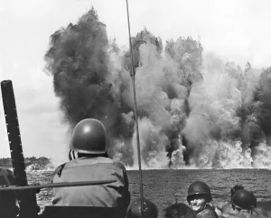 1405history Prints: A massive wall rises from the water of Peleliu from an Underwater Demolition Team operation